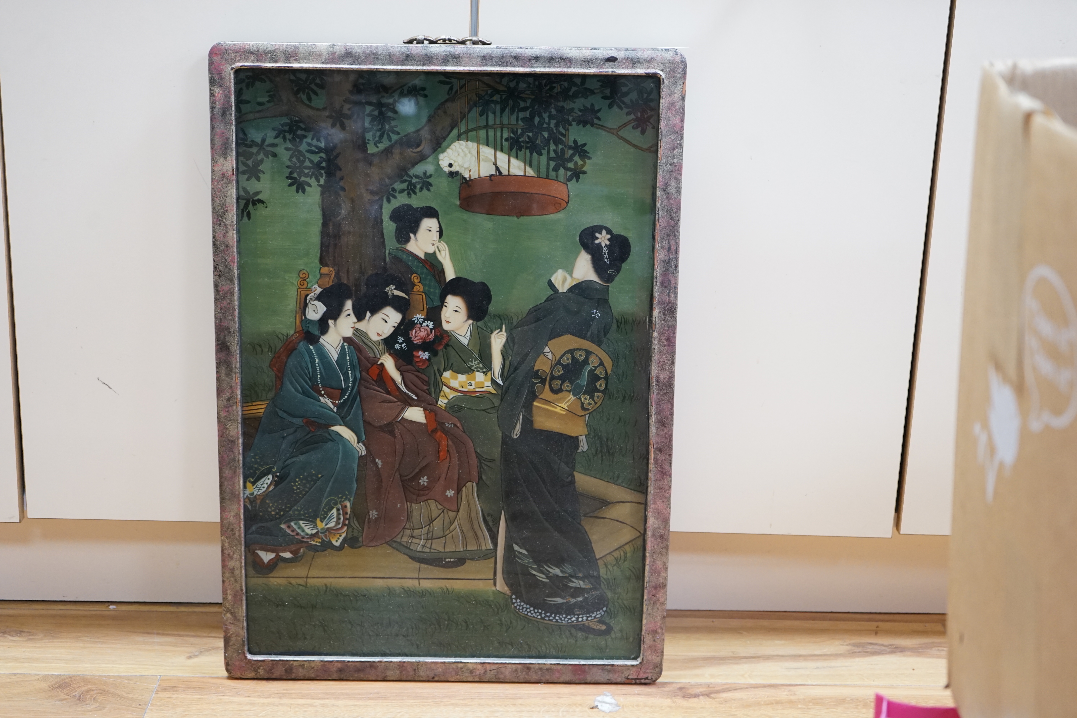 A Chinese reverse glass painted panel, ladies wearing kimonos, 64 x 44cm